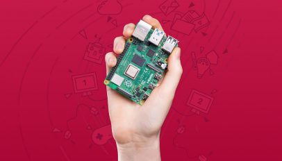 a hand holding a raspberry pi 4