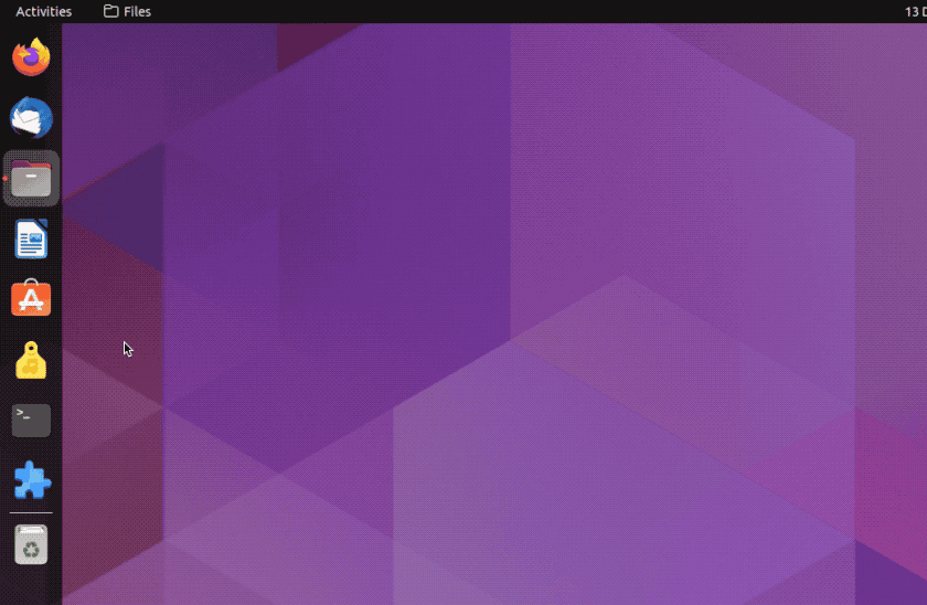 an animated gif showing icons being dragged from the Ubuntu dock and dropped on the desktop to make shortcuts