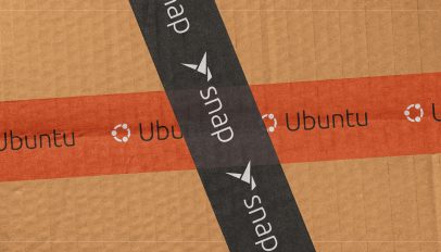 Ubuntu and snap package logos on tape across a cardboard box texture.