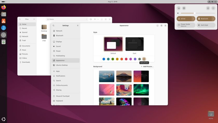 Warty Brown accent colour in Ubuntu 24.10 desktop.