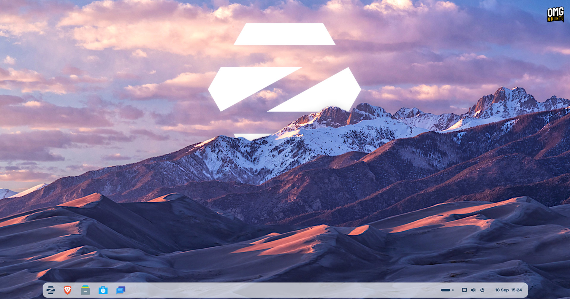 Zorin OS logo obscured by mountains.