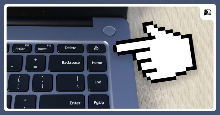 Finger points at a Xiaomi Redmibook keyboard to draw attention to its unique AI button.