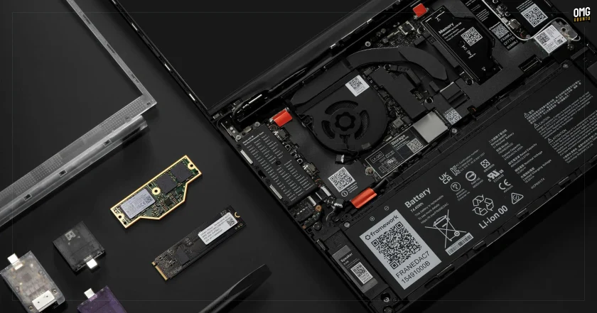 Framework 13 Pro laptop with components on a table.