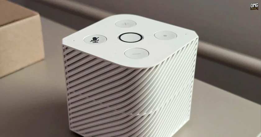 Close-up shot Pine64 PineVoice smart speaker showing its top-mounted buttons, microphone mute icon and plastic grille design.