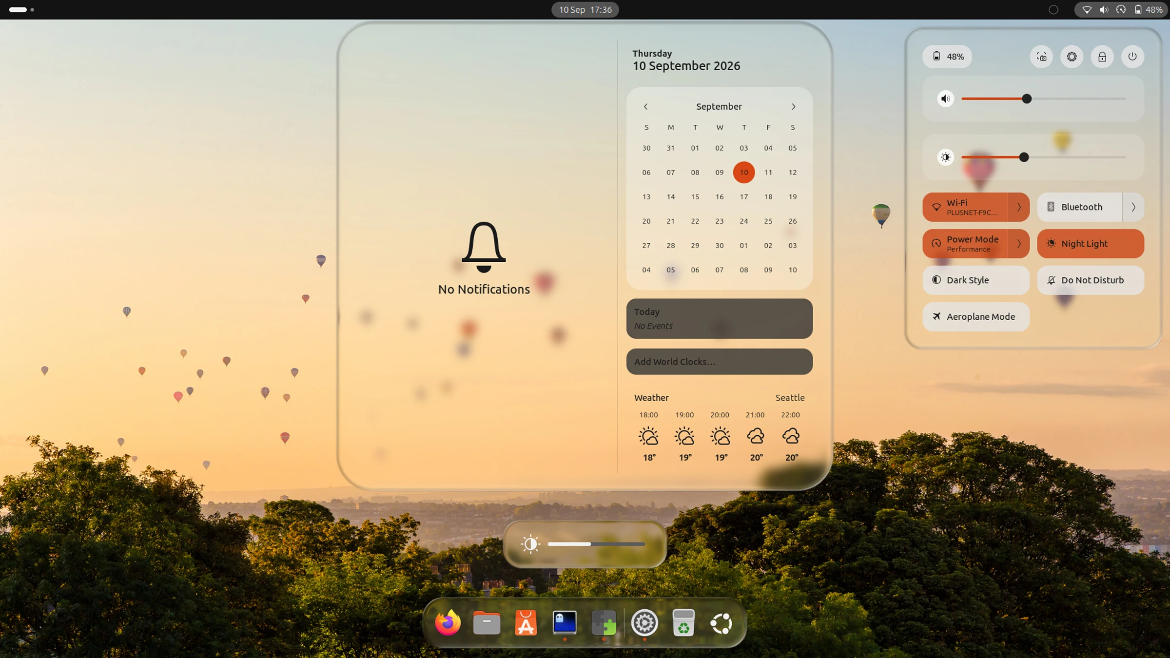 Ubuntu desktop with Liquid Glass effect on GNOME Shell UI elements including dock